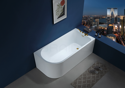 A modern freestanding white bathtub with gold-tone fixtures. Corner J Shaped